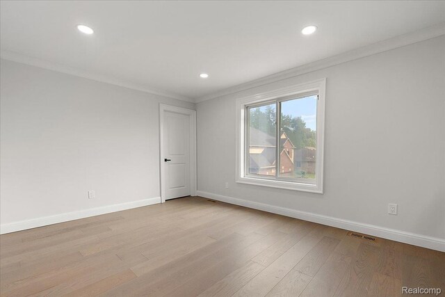 56350 Willow Creek Blvd, Utica, MI 48316 - unfurnished room featuring crown molding, recessed lighting, and wood finished floors