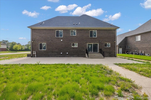 56350 Willow Creek Blvd, Utica, MI 48316 - rear view of property featuring a patio and brick siding