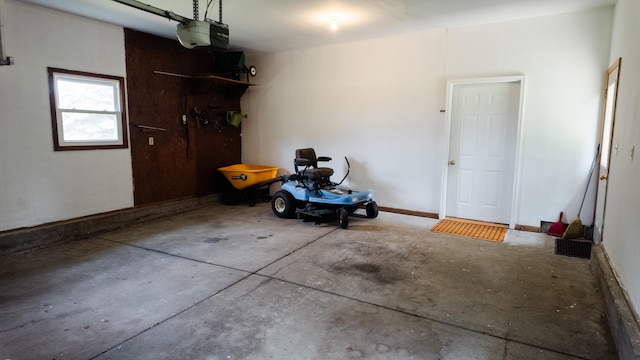 2250 Pray Rd, Charlotte, MI 48813 - garage featuring a garage door opener