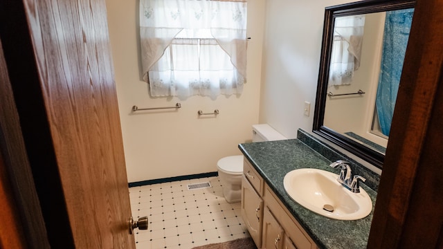 2250 Pray Rd, Charlotte, MI 48813 - bathroom with toilet and vanity