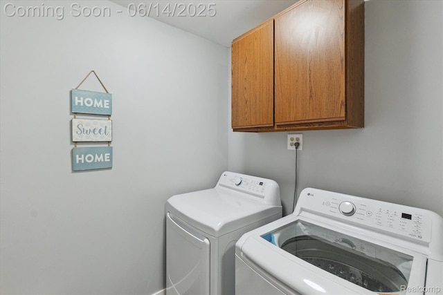 3328 S Vassar Rd, Burton, MI 48519 - laundry area with cabinet space and independent washer and dryer