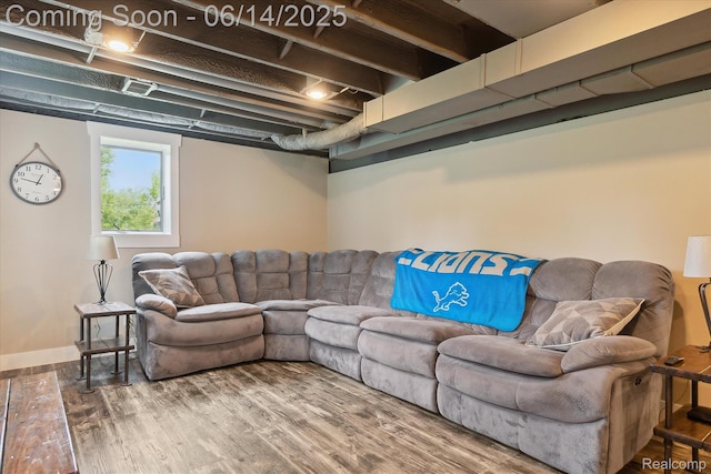 3328 S Vassar Rd, Burton, MI 48519 - living area featuring wood finished floors and baseboards