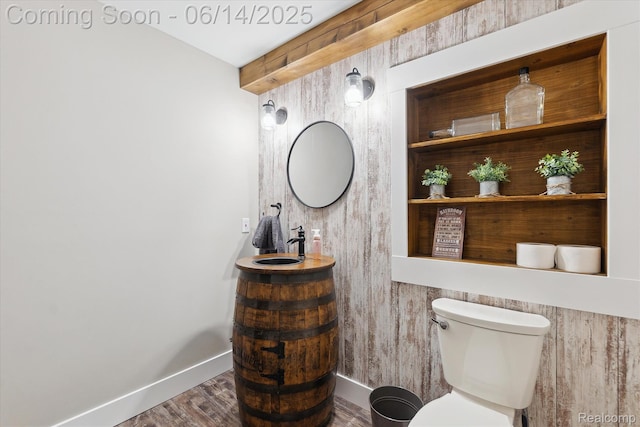 3328 S Vassar Rd, Burton, MI 48519 - bathroom with toilet and wood finished floors