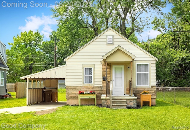 755 Robinwood St, Pontiac, MI 48340 - bungalow-style house featuring stone siding and concrete driveway