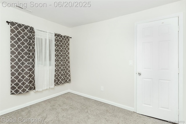 755 Robinwood St, Pontiac, MI 48340 - carpeted spare room featuring baseboards