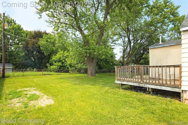 755 Robinwood St, Pontiac, MI 48340 - fenced backyard with a deck