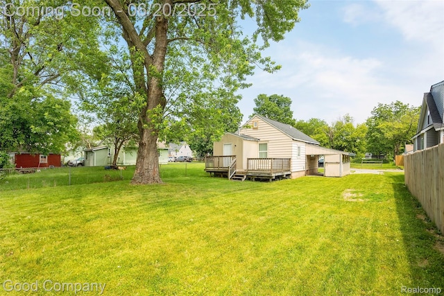 755 Robinwood St, Pontiac, MI 48340 - view of yard featuring a deck