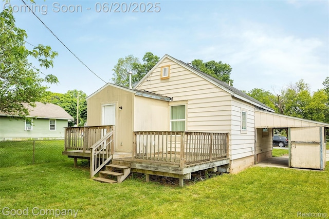 755 Robinwood St, Pontiac, MI 48340 - back of property featuring a deck and an attached carport
