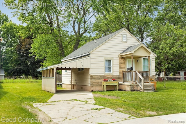 755 Robinwood St, Pontiac, MI 48340 - bungalow-style home featuring concrete driveway, a shingled roof, stone siding, and a carport