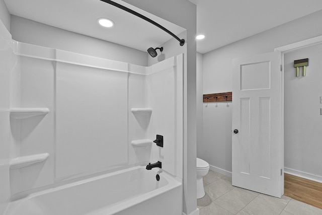 8475 Homerich Ave SW, Byron Center, MI 49315 - bathroom with bathtub / shower combination, tile patterned floors, and recessed lighting