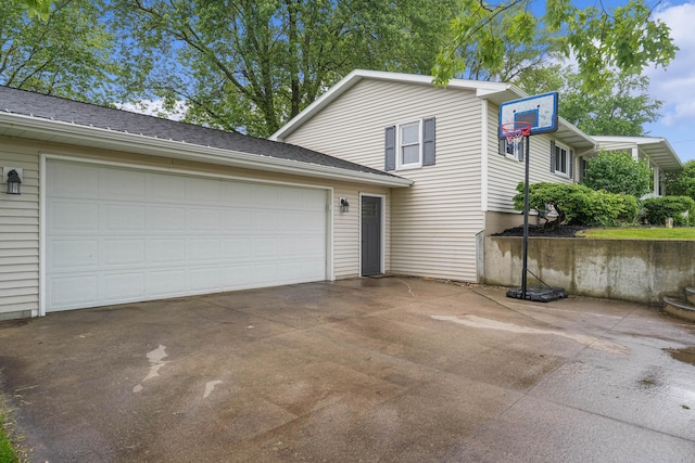 8475 Homerich Ave SW, Byron Center, MI 49315 - view of side of property with driveway and an attached garage