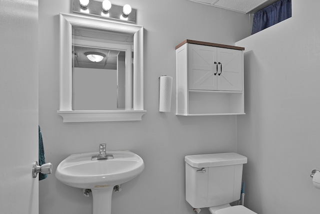 8475 Homerich Ave SW, Byron Center, MI 49315 - half bathroom featuring toilet