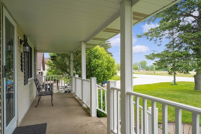 8475 Homerich Ave SW, Byron Center, MI 49315 - covered porch featuring a yard