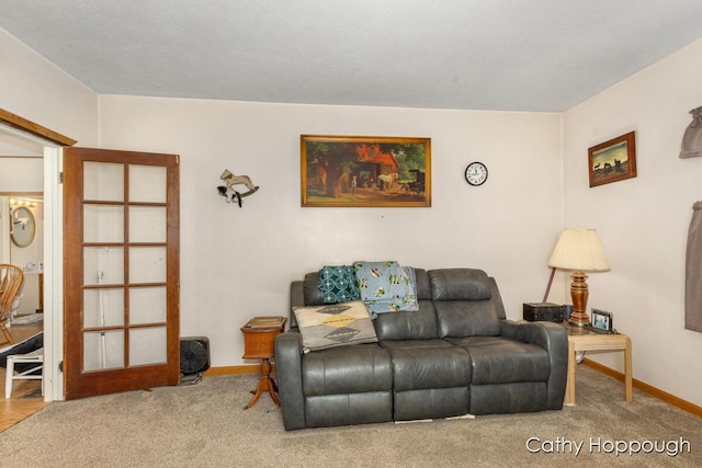 3119 S Hillman Rd, Sidney, MI 48885 - carpeted living room with baseboards