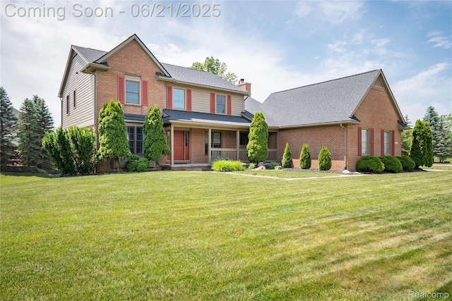 48671 Timber Crest Ct, Plymouth, MI 48170 - view of front of home featuring brick siding, covered porch, a chimney, a front yard, and roof with shingles