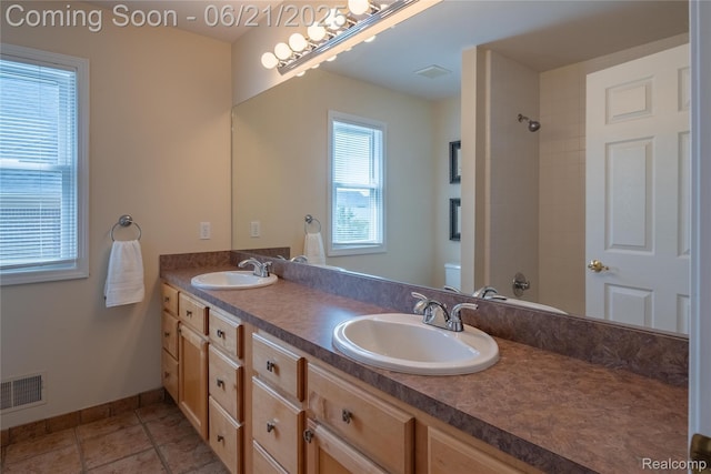 48671 Timber Crest Ct, Plymouth, MI 48170 - full bathroom with double vanity, a shower, and tile patterned floors