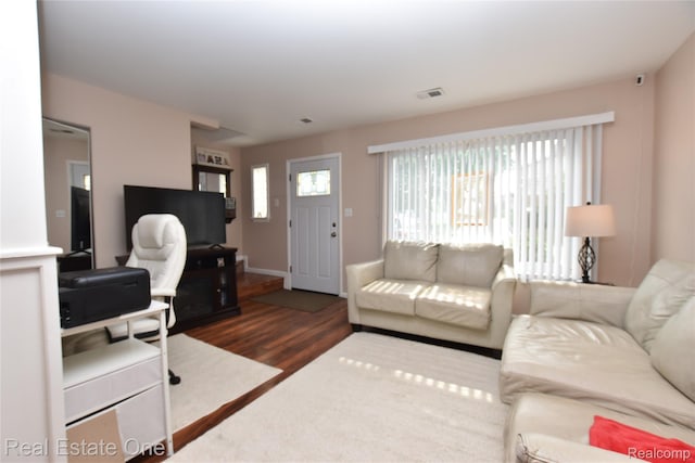 1350 Laurel Valley Dr, Waterford, MI 48327 - living room featuring wood finished floors and baseboards