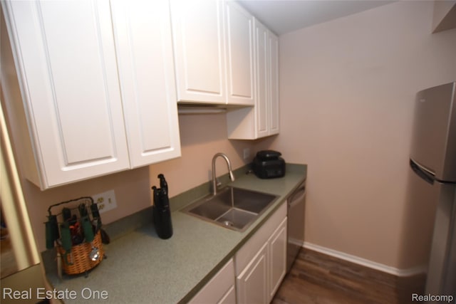 1350 Laurel Valley Dr, Waterford, MI 48327 - kitchen with stainless steel appliances, white cabinetry, and wood finished floors