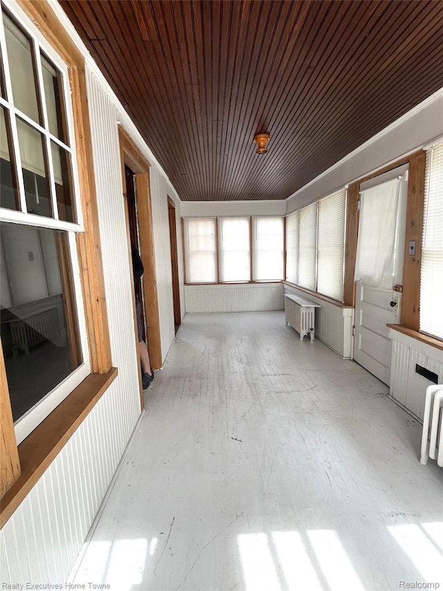 1209 Miller St, Port Huron, MI 48060 - unfurnished sunroom with radiator heating unit