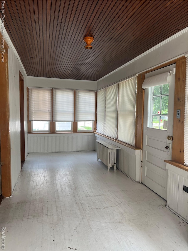 1209 Miller St, Port Huron, MI 48060 - unfurnished sunroom featuring radiator