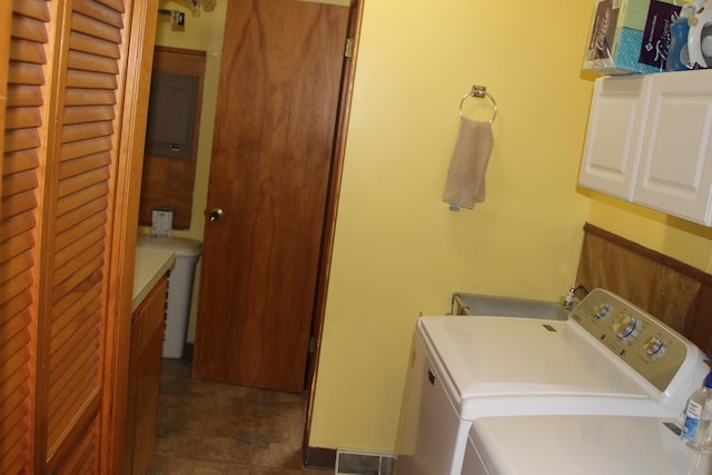 229 Riverside Dr, Hart, MI 49420 - laundry room featuring cabinet space and washer and dryer