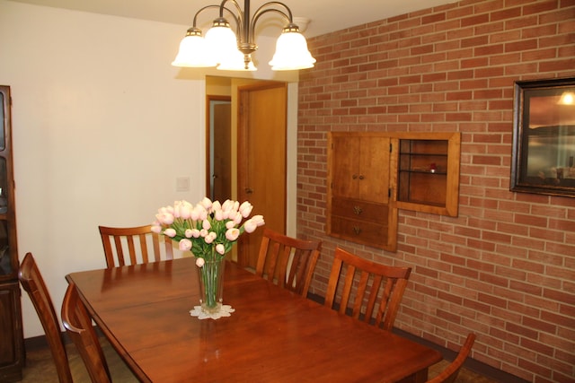 229 Riverside Dr, Hart, MI 49420 - dining room featuring a chandelier