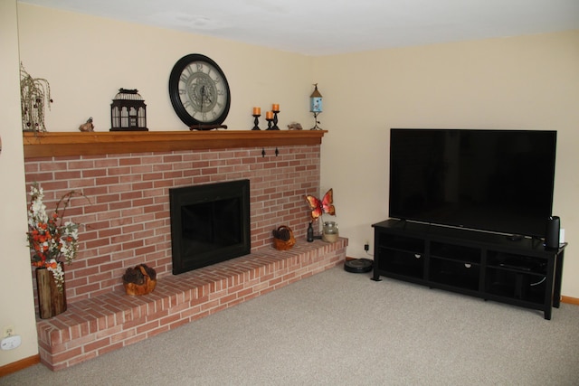 229 Riverside Dr, Hart, MI 49420 - living area with carpet and a brick fireplace