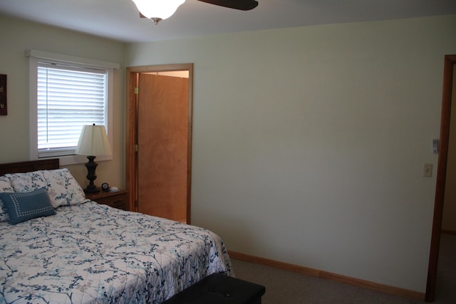 229 Riverside Dr, Hart, MI 49420 - carpeted bedroom with baseboards and a ceiling fan