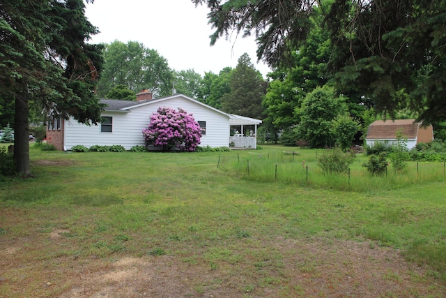 229 Riverside Dr, Hart, MI 49420 - view of grassy yard
