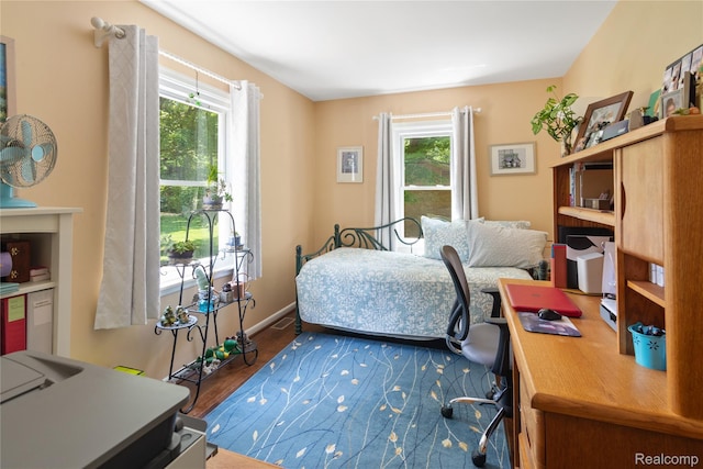 20551 Elwell Rd, Belleville, MI 48111 - bedroom with wood finished floors and a desk