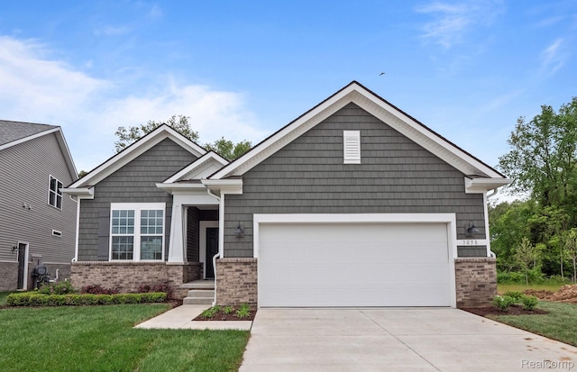 3045 Sheffield Cir, Clarkston, MI 48346 - craftsman house featuring a garage, concrete driveway, brick siding, and a front lawn