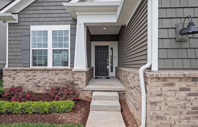 3045 Sheffield Cir, Clarkston, MI 48346 - doorway to property with brick siding