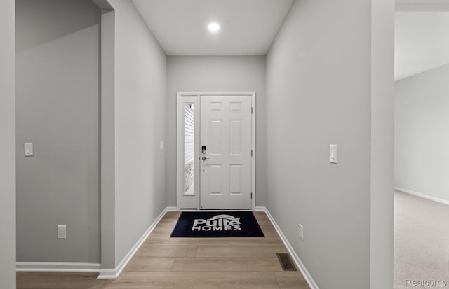 3045 Sheffield Cir, Clarkston, MI 48346 - entryway featuring wood finished floors and baseboards