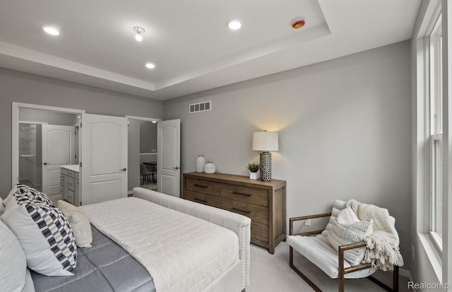 3045 Sheffield Cir, Clarkston, MI 48346 - bedroom with a tray ceiling, recessed lighting, and light carpet