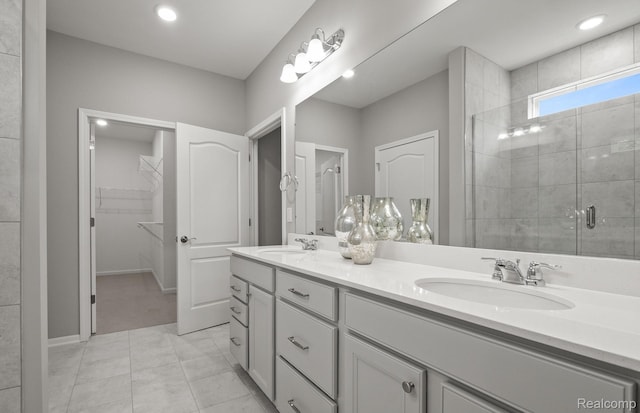 3045 Sheffield Cir, Clarkston, MI 48346 - full bath featuring double vanity, a stall shower, a spacious closet, and recessed lighting