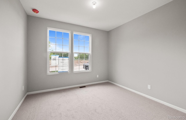 3045 Sheffield Cir, Clarkston, MI 48346 - carpeted empty room with baseboards