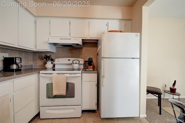 7615 Woodview St # 3, Westland, MI 48185 - kitchen featuring white appliances, under cabinet range hood, decorative backsplash, and white cabinetry