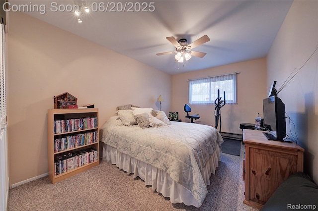 7615 Woodview St # 3, Westland, MI 48185 - carpeted bedroom featuring baseboard heating and a ceiling fan
