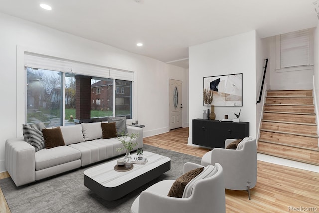 3297 Taylor St, Detroit, MI 48206 - living area with wood finished floors, stairs, and recessed lighting