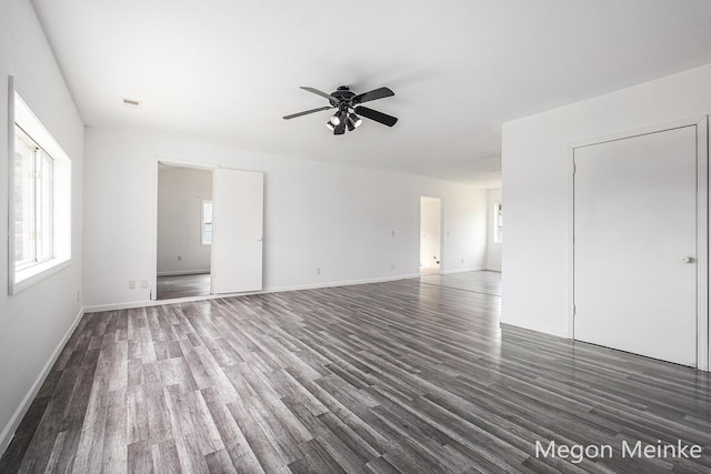 3682 W Long Lake Rd, Orleans, MI 48865 - unfurnished living room featuring ceiling fan and wood finished floors