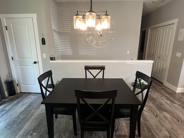 2650 Eagle Rdg, Muskegon, MI 49444 - dining area featuring wood finished floors and a chandelier