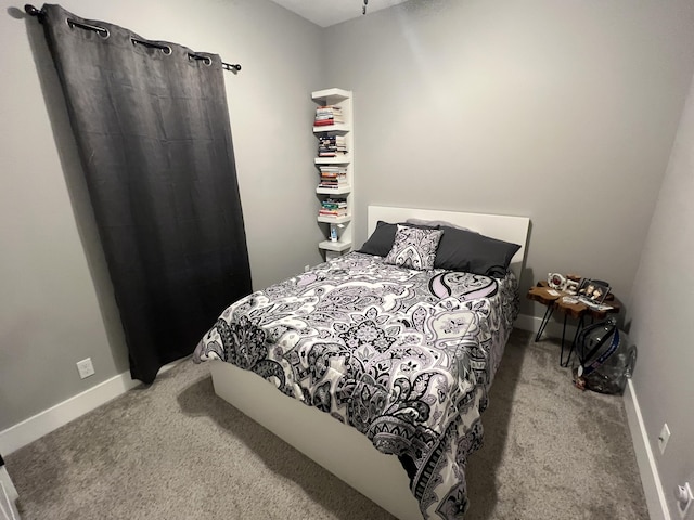 2650 Eagle Rdg, Muskegon, MI 49444 - carpeted bedroom featuring baseboards