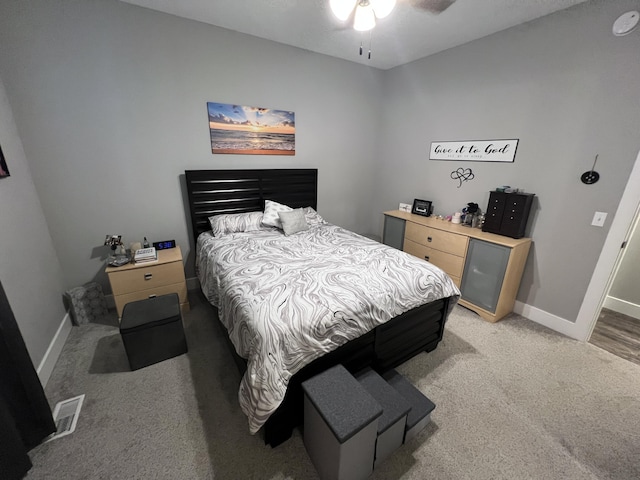 2650 Eagle Rdg, Muskegon, MI 49444 - bedroom with light colored carpet and ceiling fan