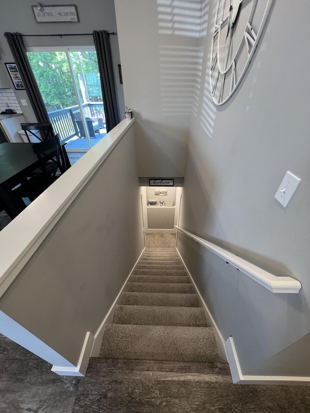 2650 Eagle Rdg, Muskegon, MI 49444 - stairway featuring baseboards