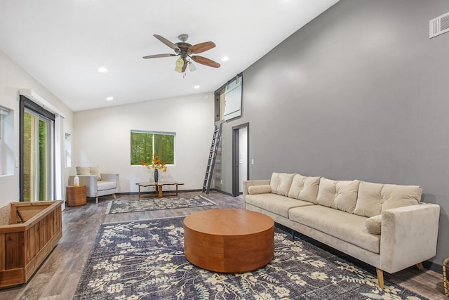 6490 Island Lake Rd, Holland, MI 49423 - living room featuring vaulted ceiling, wood finished floors, a ceiling fan, and recessed lighting