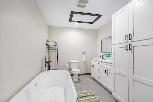 6490 Island Lake Rd, Holland, MI 49423 - full bathroom featuring a freestanding bath, double vanity, and wood finished floors