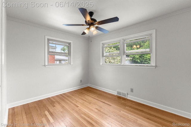 30345 Rush St, Garden City, MI 48135 - unfurnished room with light wood finished floors, ceiling fan, and ornamental molding