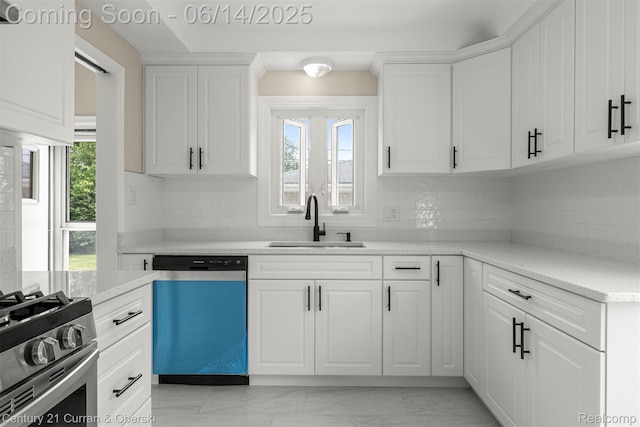 30345 Rush St, Garden City, MI 48135 - kitchen featuring dishwasher, white cabinets, stainless steel range with gas cooktop, and tasteful backsplash