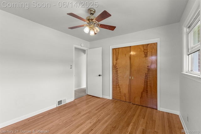 30345 Rush St, Garden City, MI 48135 - unfurnished bedroom featuring light wood-style floors, a closet, and ceiling fan