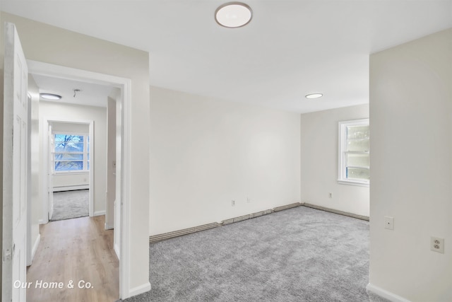 7698 E Holland Rd, Saginaw, MI 48601 - empty room featuring healthy amount of natural light and carpet